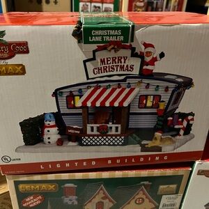 Lemax Merry Christmas Lighted Trailer with Red and White Accents